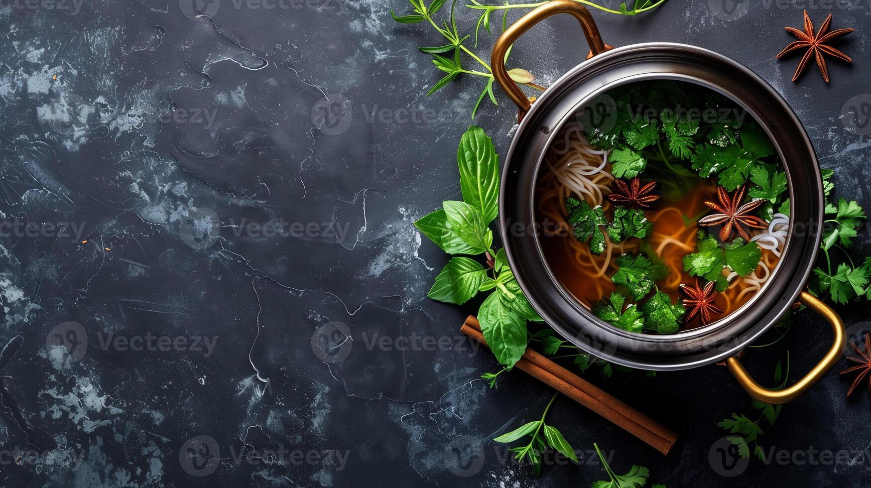 Traditional Vietnamese pho broth with star anise cloves and cinnamon ready for rice noodles and fresh herbs, photography photo