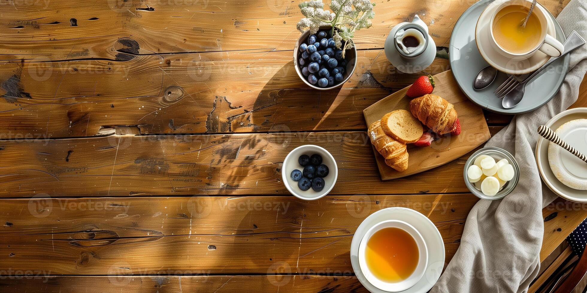 Overhead shot of cozy breakfast table with copy space on one side, photorealistic photo