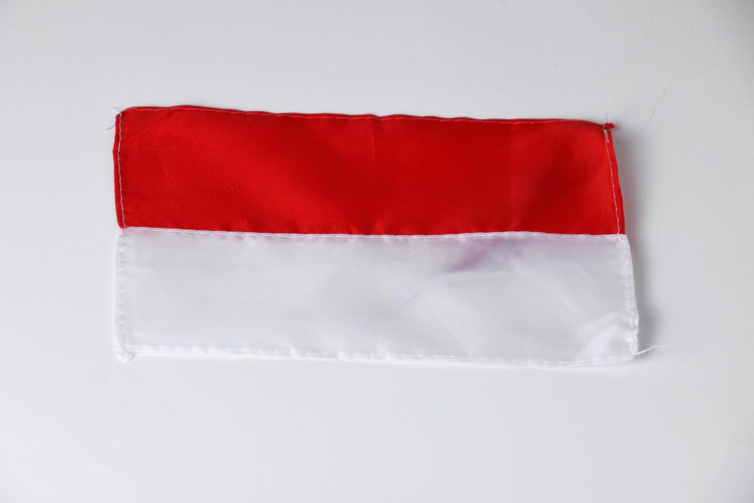 The red and white flag on a white isolated background photo