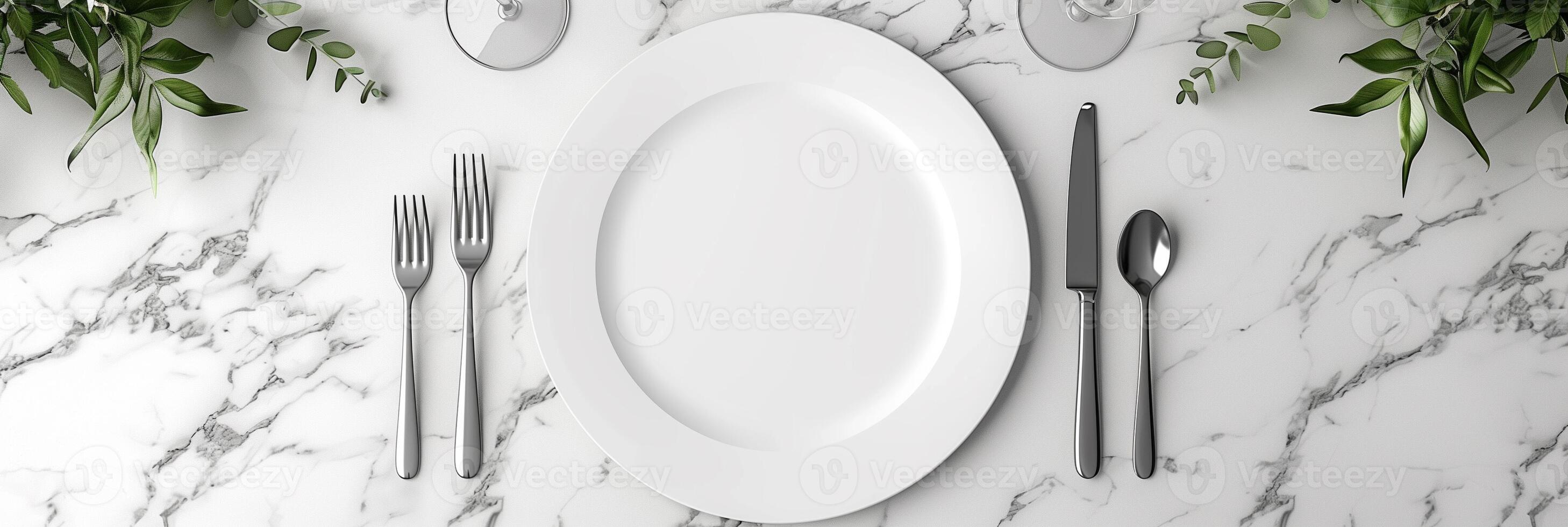 White circle paper mockup on a clean white marble table with a wine glass, knife, and fork, photo