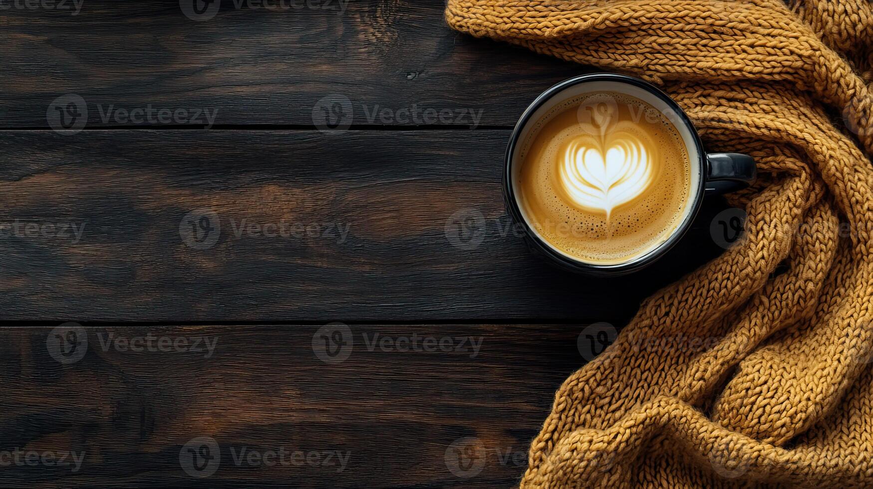 Cozy scene with a coffee cup and a knitted scarf on a rustic table photo