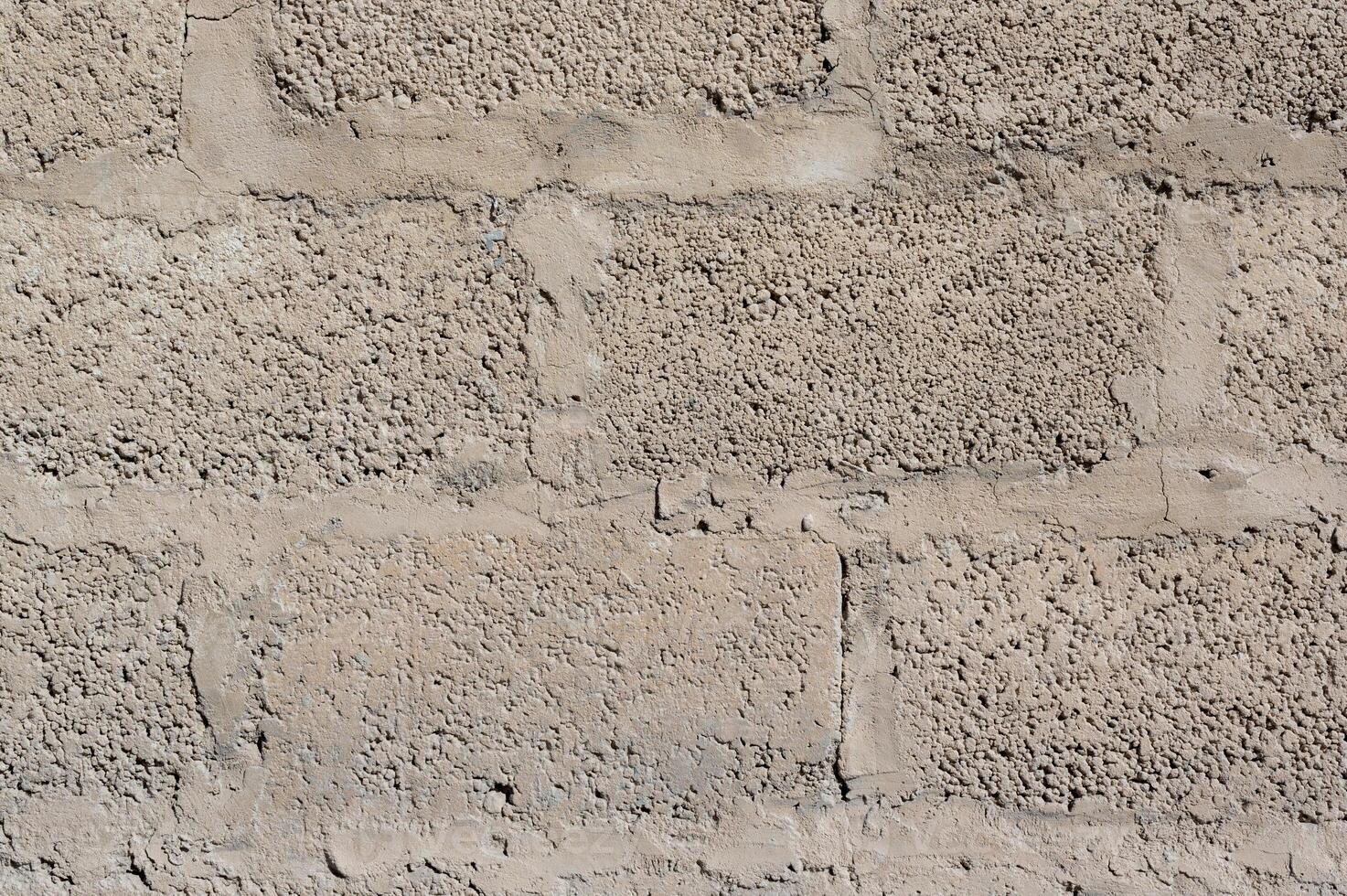 Grey brick wall background close up. Gray stone tile block background with horizontal texture of gray brick. Gray brick surface. photo