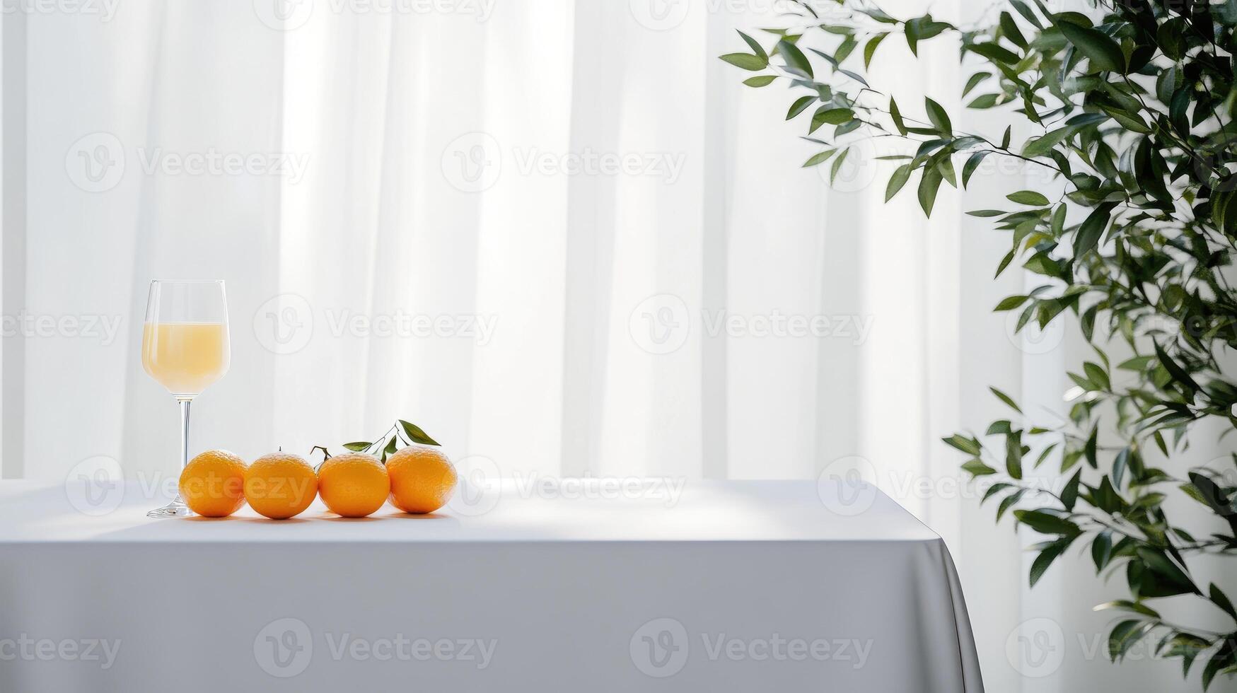 A table with two glasses of champagne and oranges photo