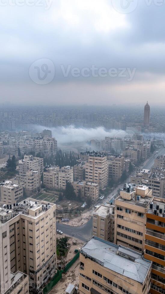 A view of the city from above with buildings and fog photo