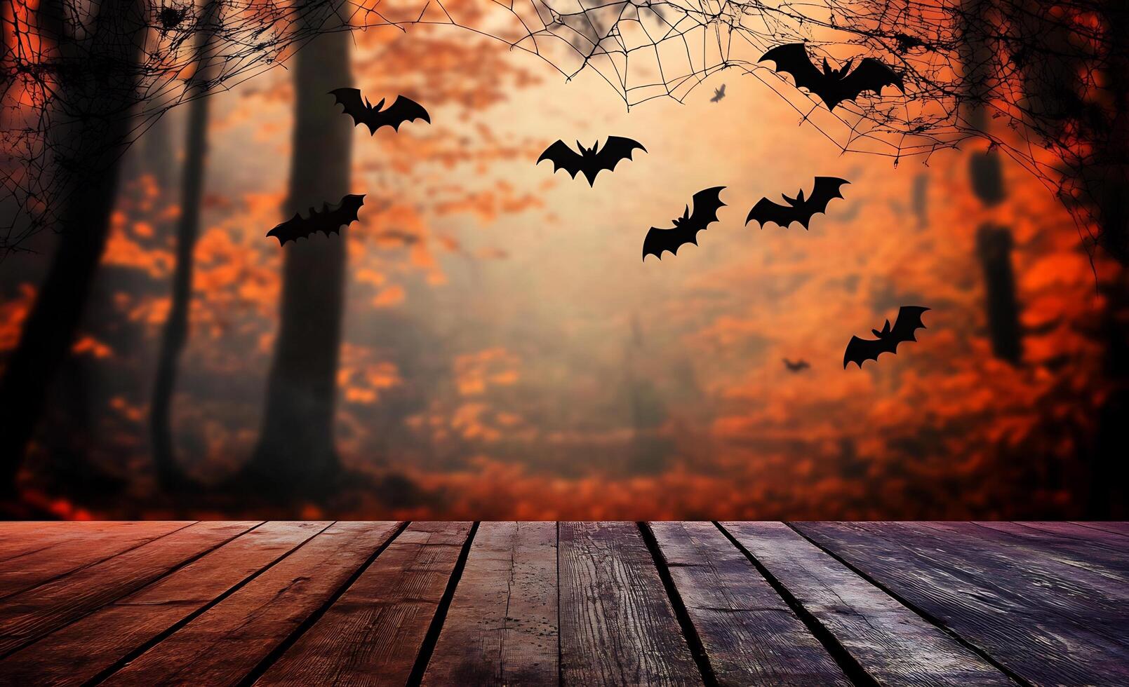 Halloween background with bats flying over a wooden floor photo