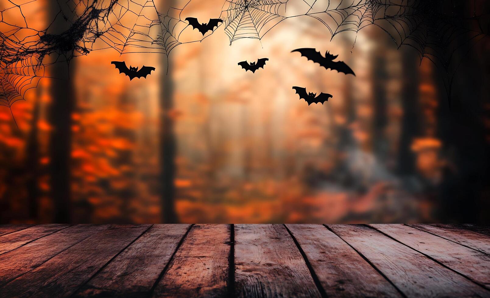 Halloween background with bats flying over a wooden floor photo