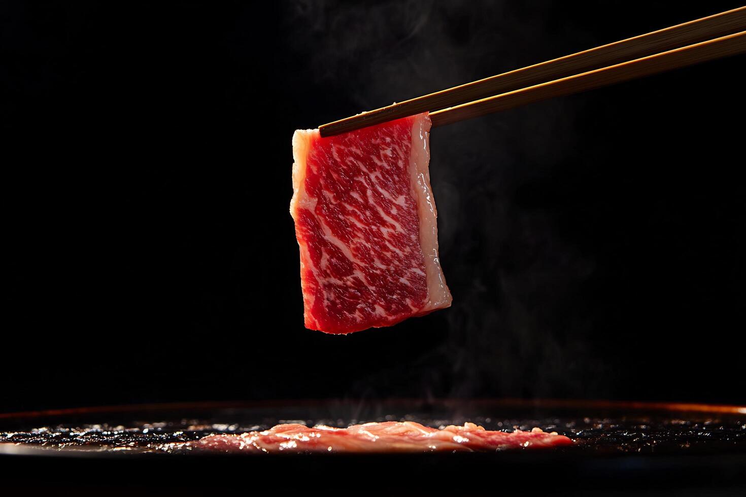 A piece of meat being cooked on a grill photo