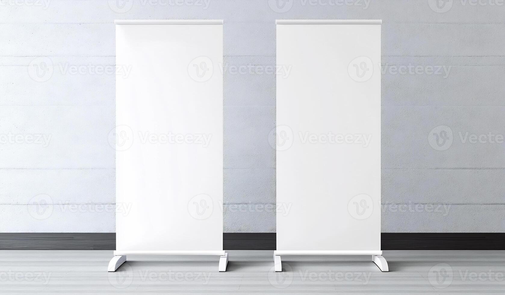 Two white roll up banners on a wall photo