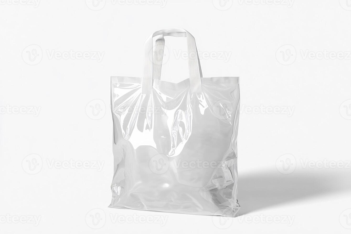 A clear plastic bag sitting on a white surface photo