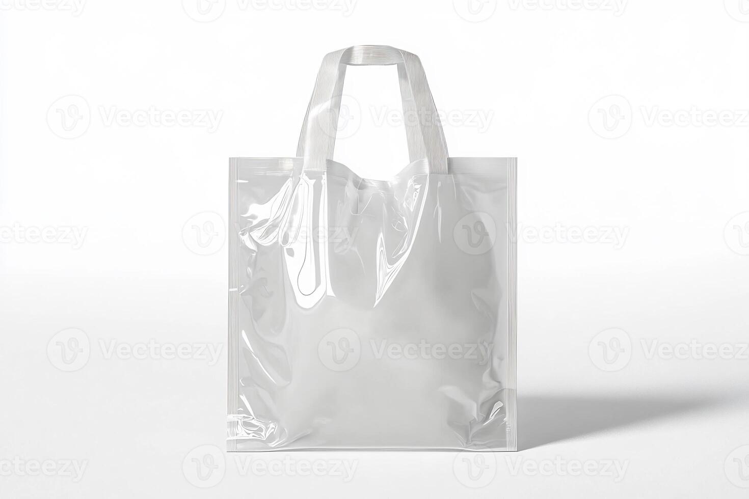 A clear plastic bag sitting on a white surface photo
