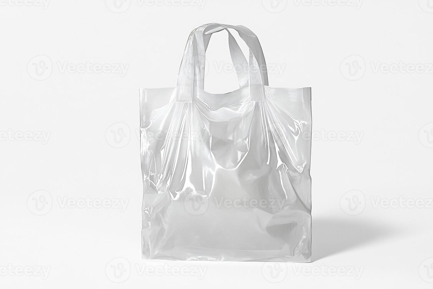 A clear plastic bag sitting on a white surface photo