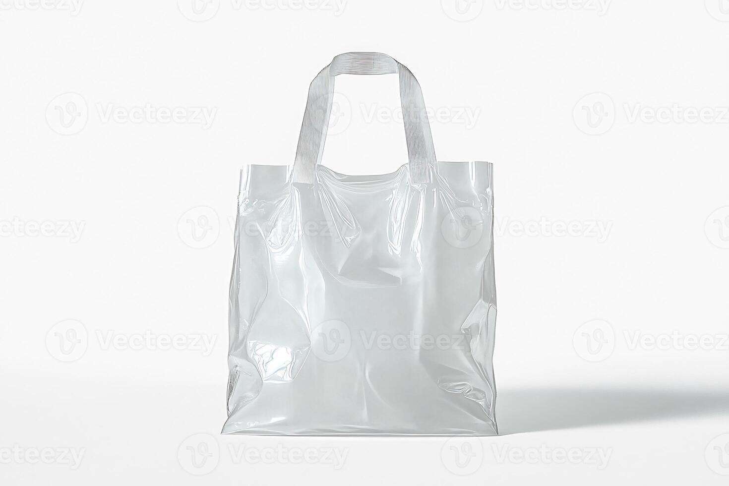 A white plastic bag sitting on a white surface photo