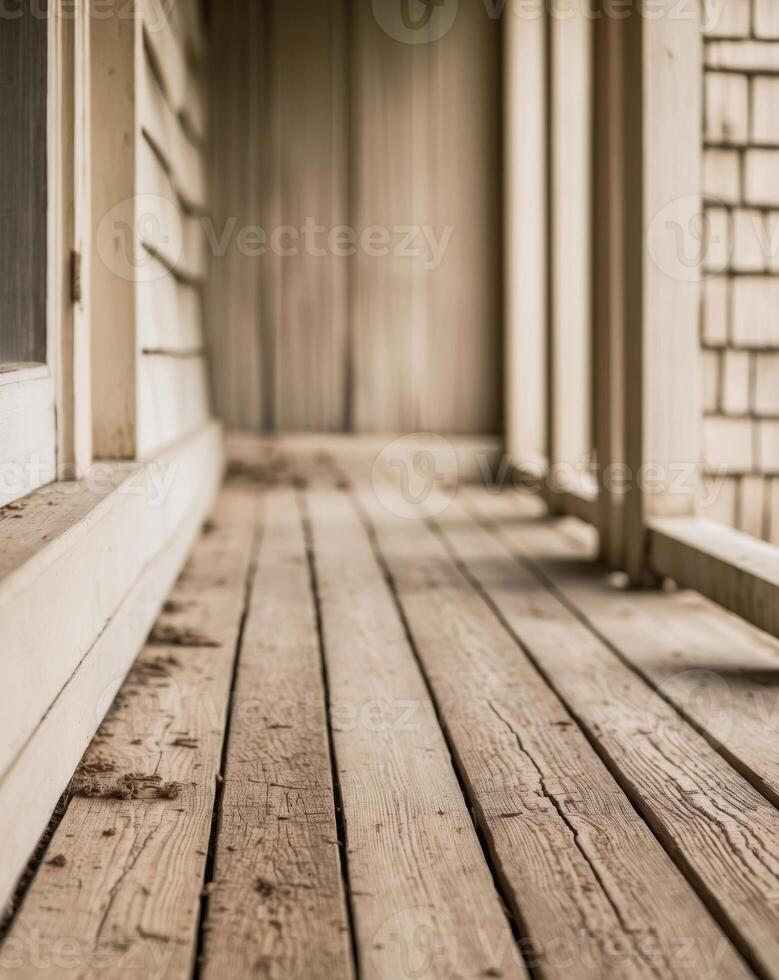 A wooden porch with a window and a door photo