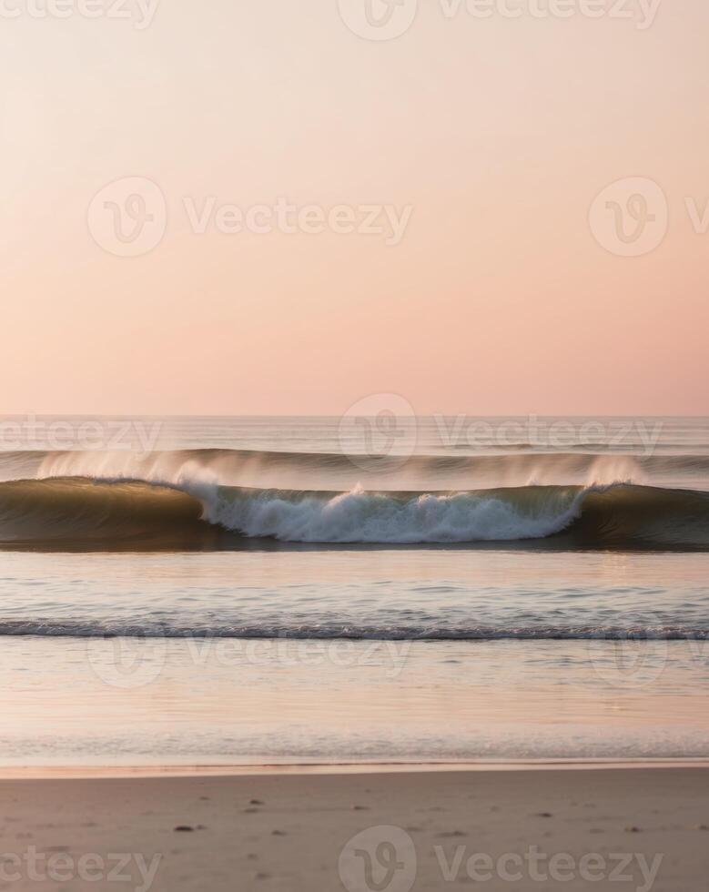 Serene Ocean Waves Crashing on Sandy Beach at Golden Sunset photo