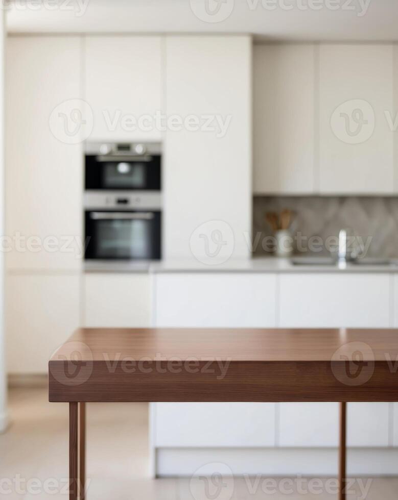 Wooden Tabletop in a Blurred Modern Kitchen Background photo