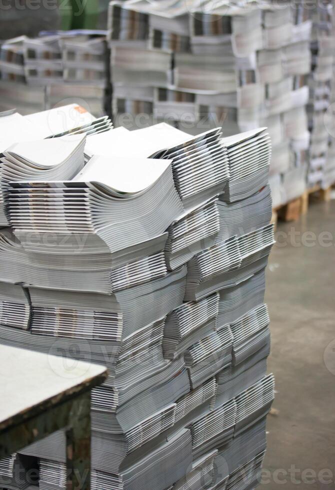 A stack of papers in a warehouse photo