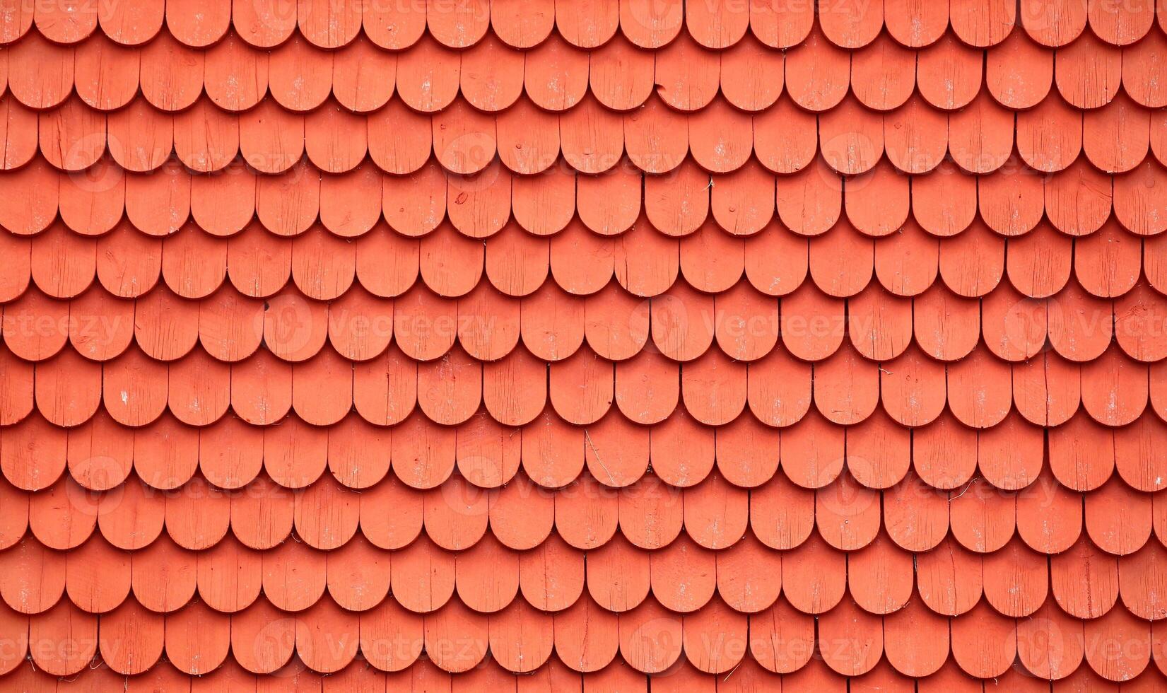 Texture of wooden tiles painted typically Swedish with falu red photo