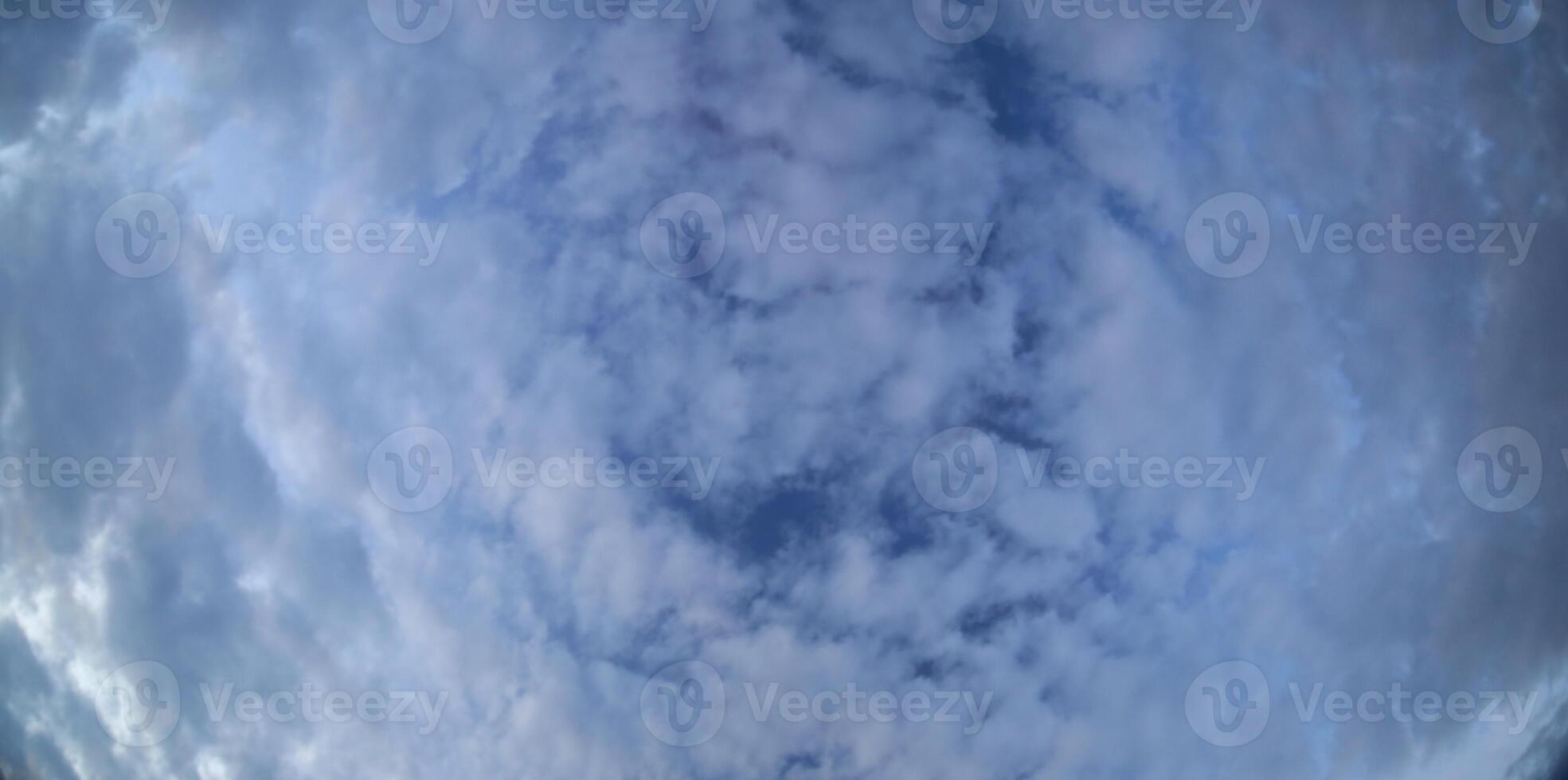 Stitched wide angle shot of altocumulus floccatus clouds photo