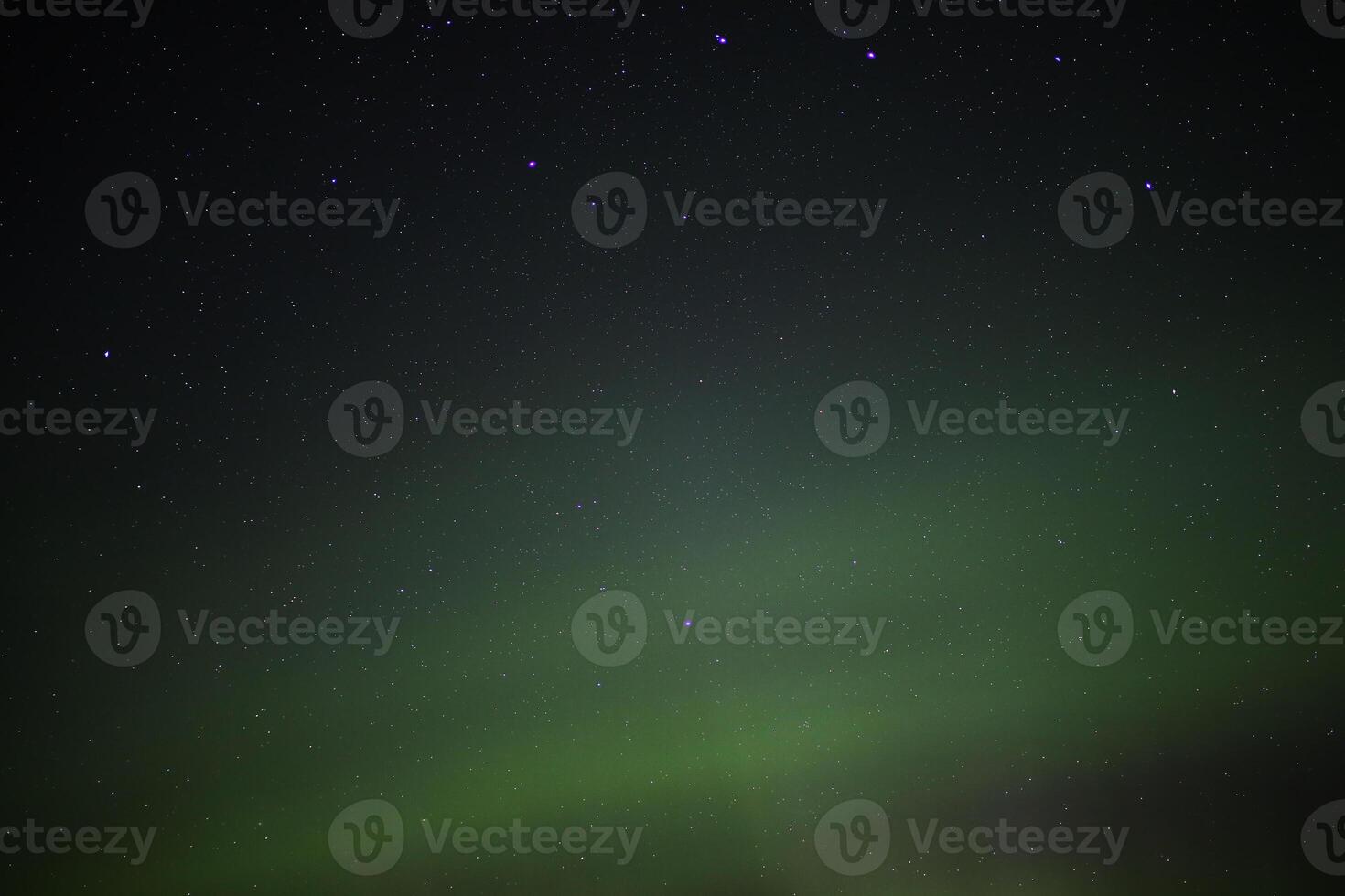 Northern lights and bright stars in the night photo