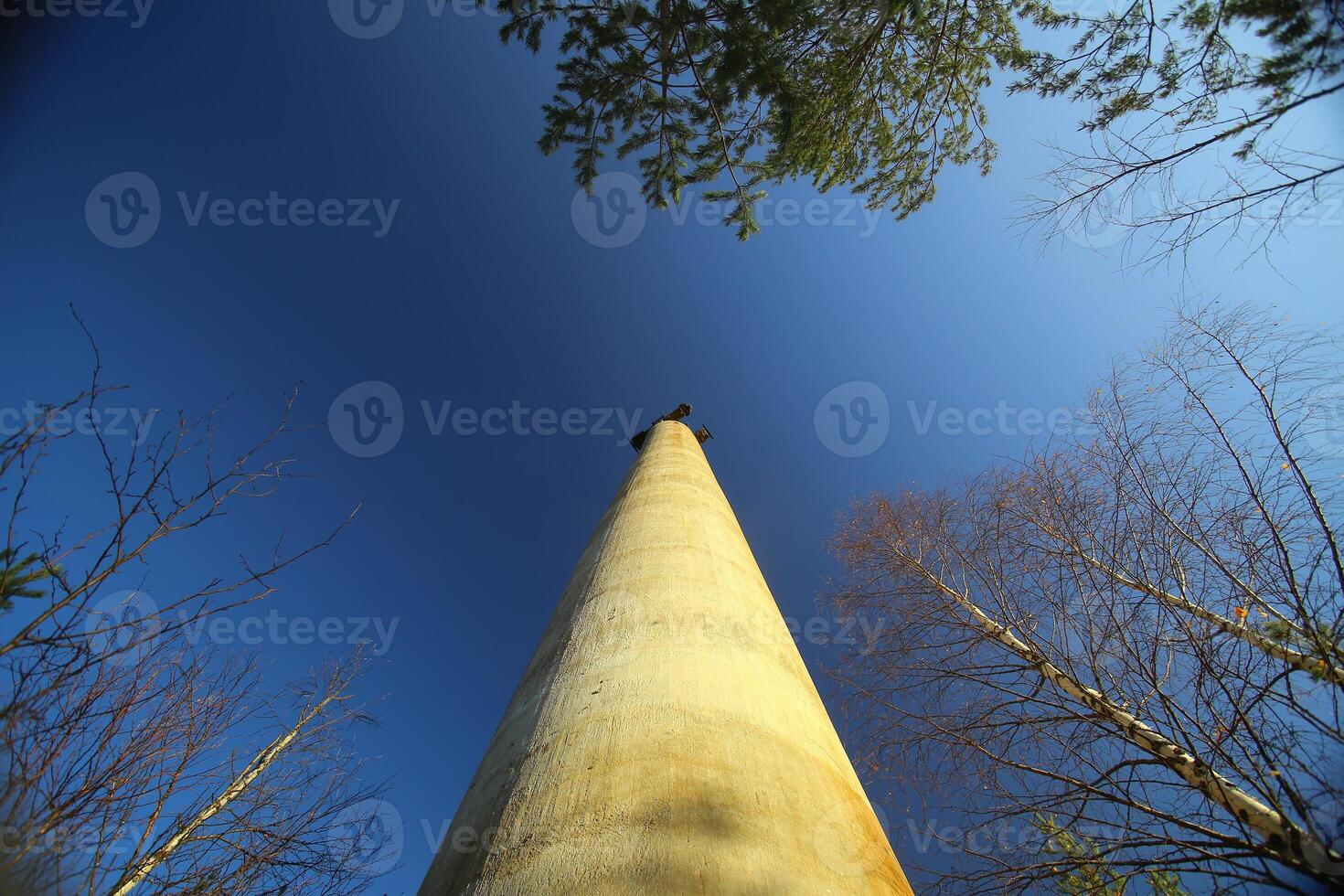 Conceptual low angle view of concrete pillar of the disused Norsjo aerial tramway photo