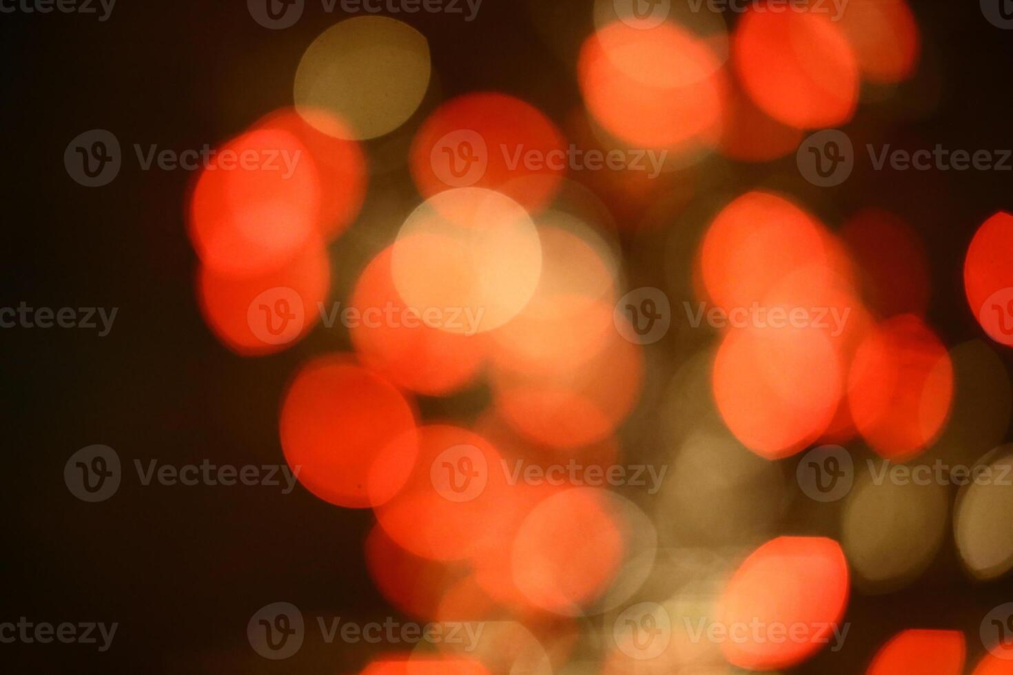 Blurred red and yellow lights with slightly oval shape photo