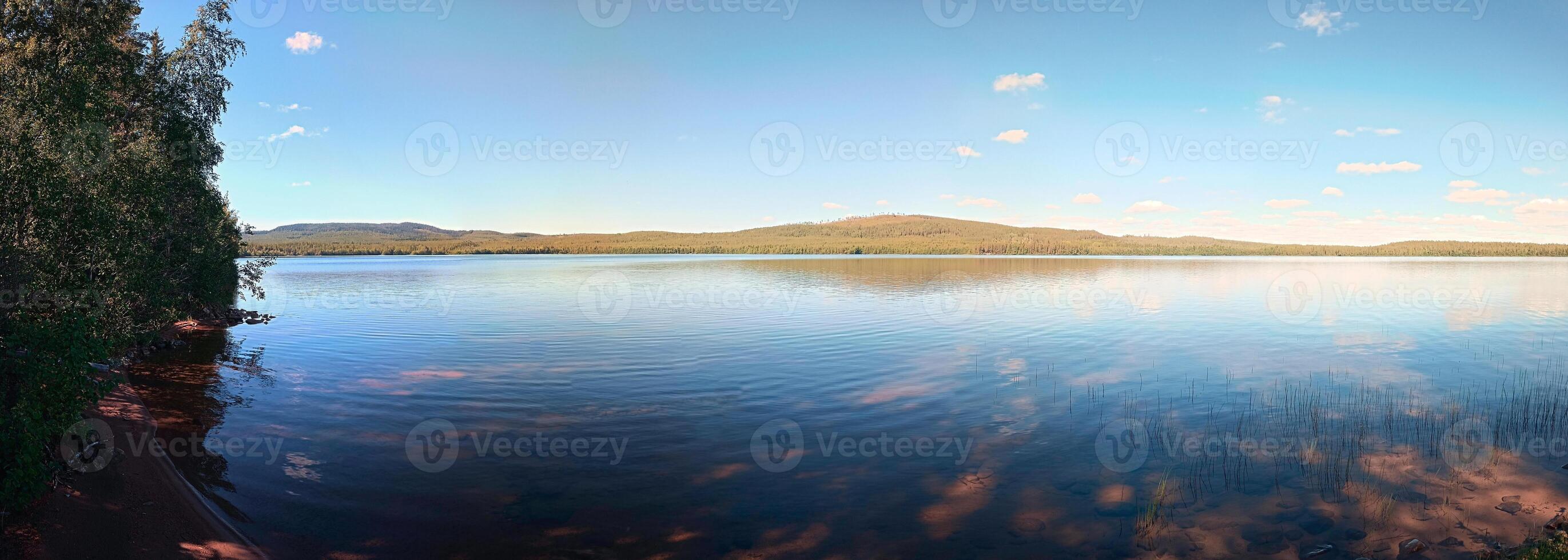 View over lake Bredtrasket in Swedish Lapland photo
