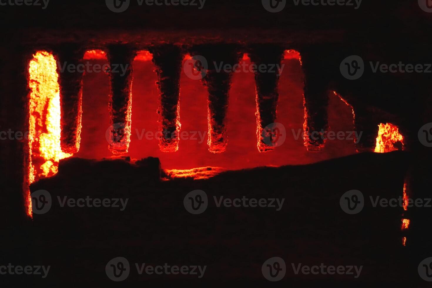 Detail of sooty rack inside an old furnace photo