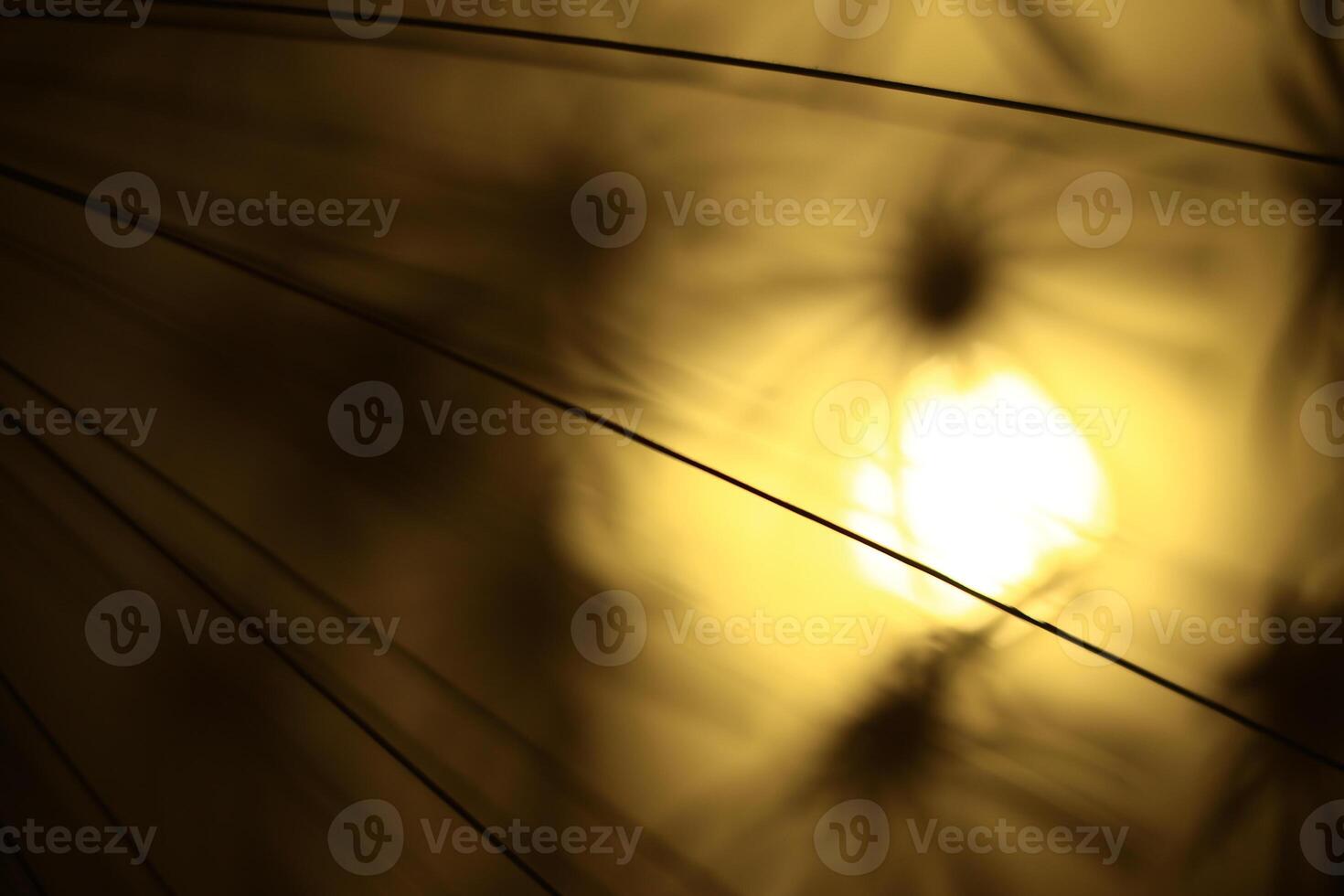 Abstract defocused shot of indoor lamp, usable as background photo