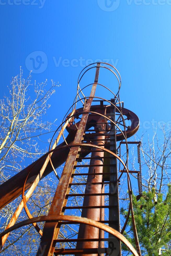 Rusty machinery at an old mining site photo