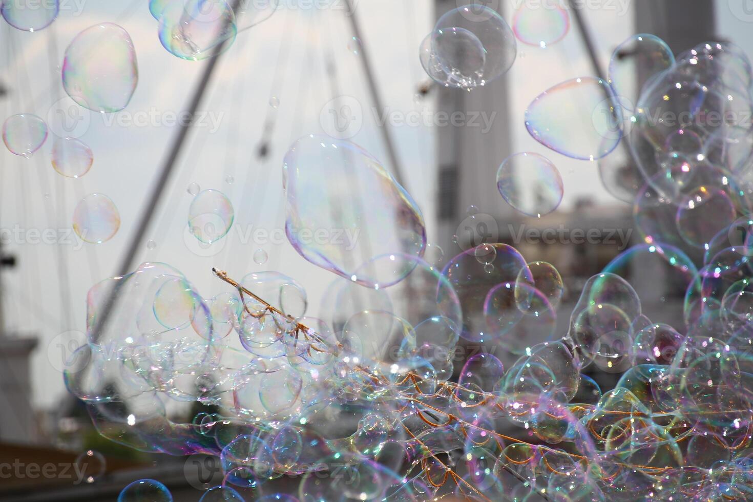 Many colorful bubbles in front of ship photo