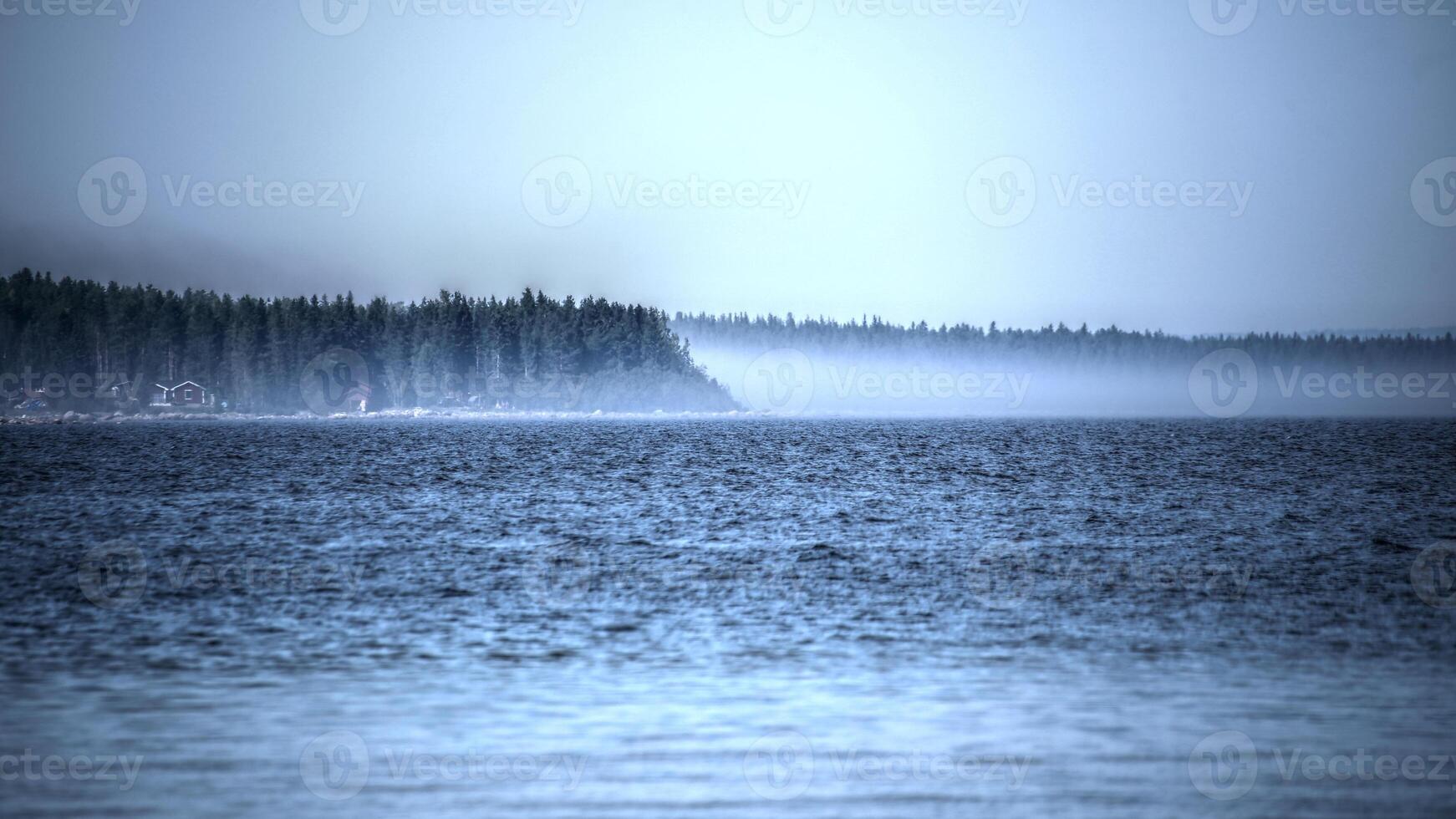 Misty weather on the baltic sea in northern Sweden photo