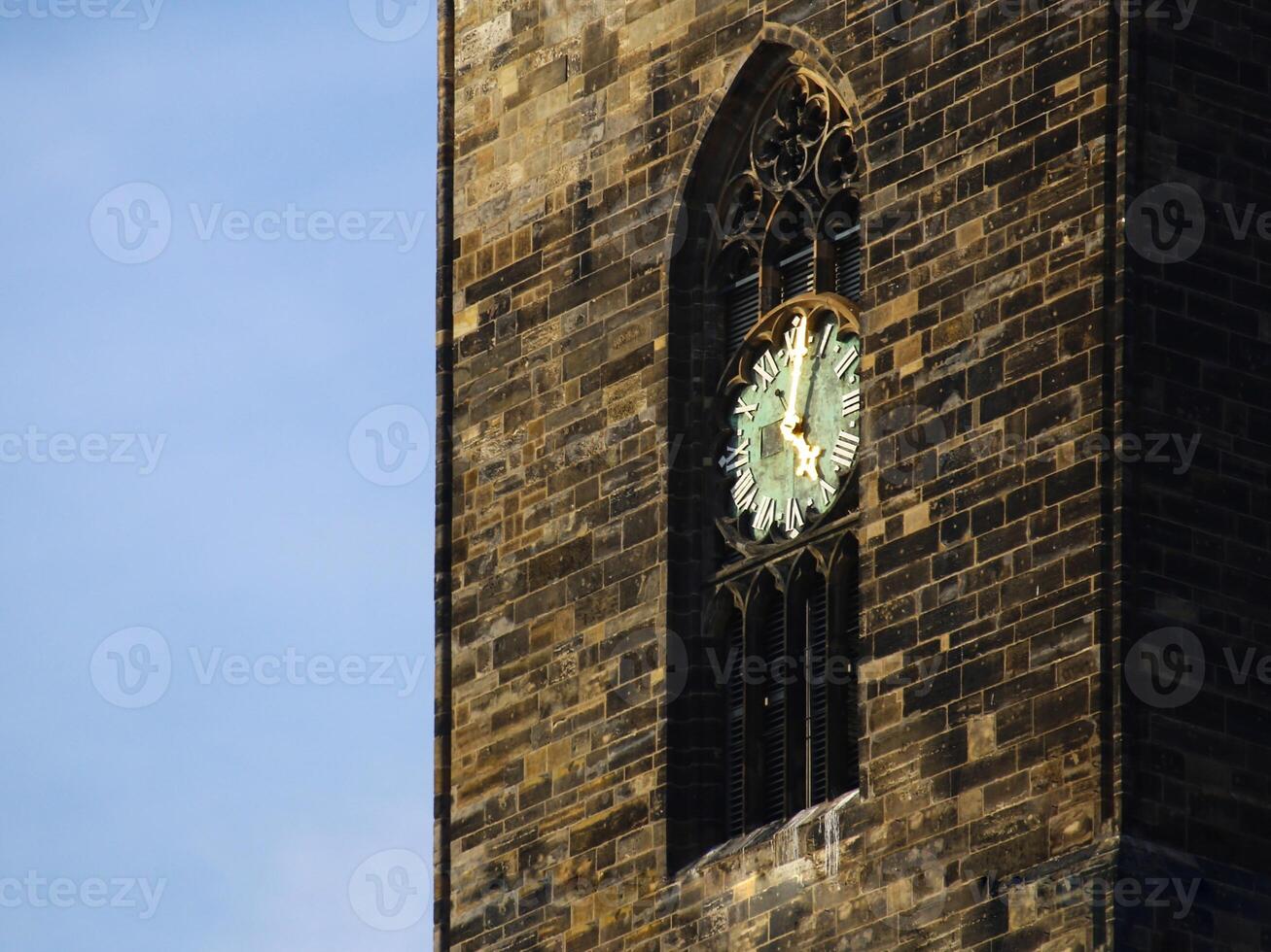 Dial of Magdeburger Dom Magdeburg Cathedral with bright sunlight reflections photo