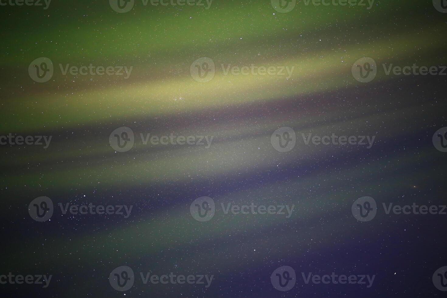 Soft northern light curtains in the sky photo