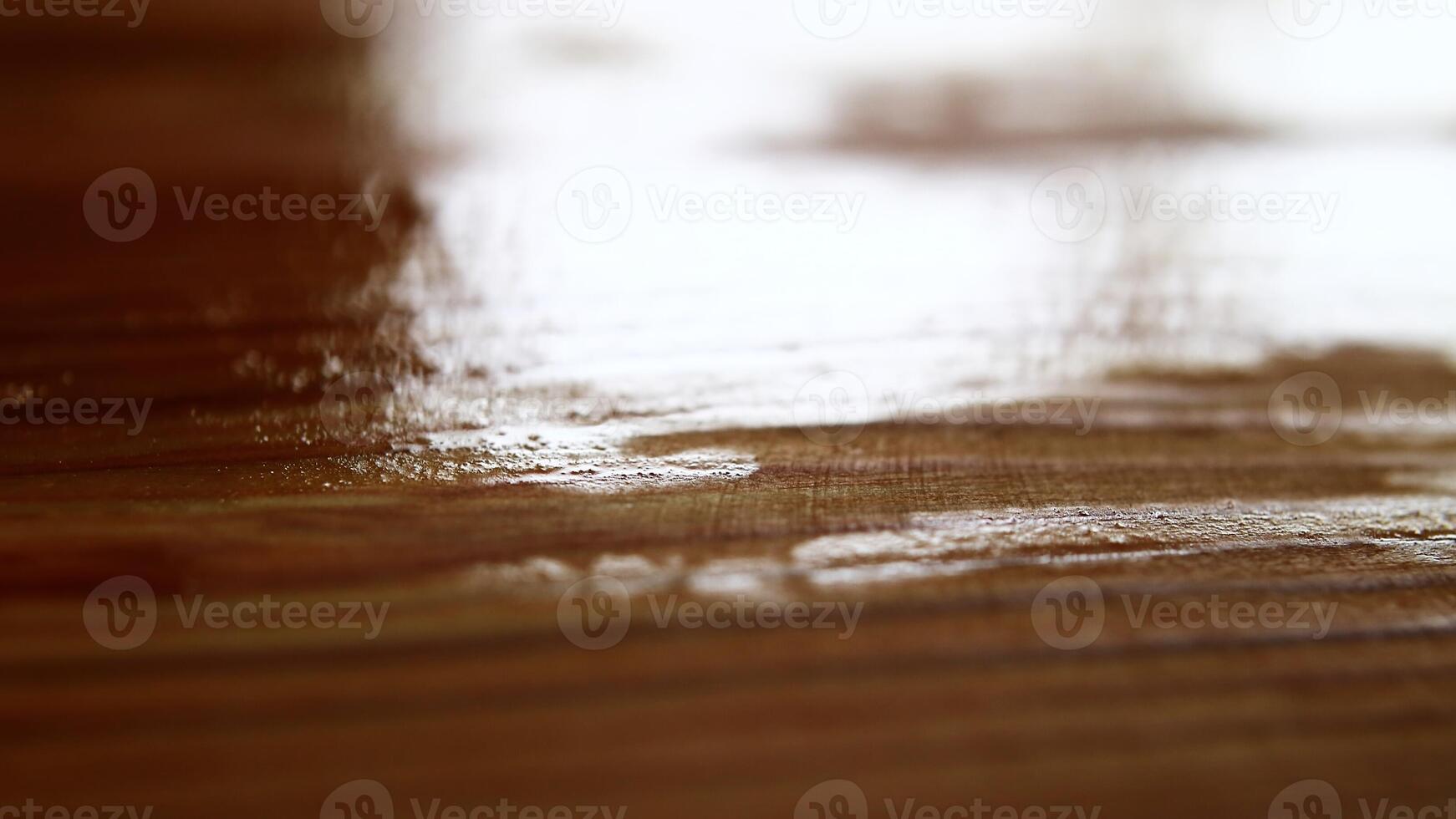 Uneven layer of linseed oil paint on wooden surface photo