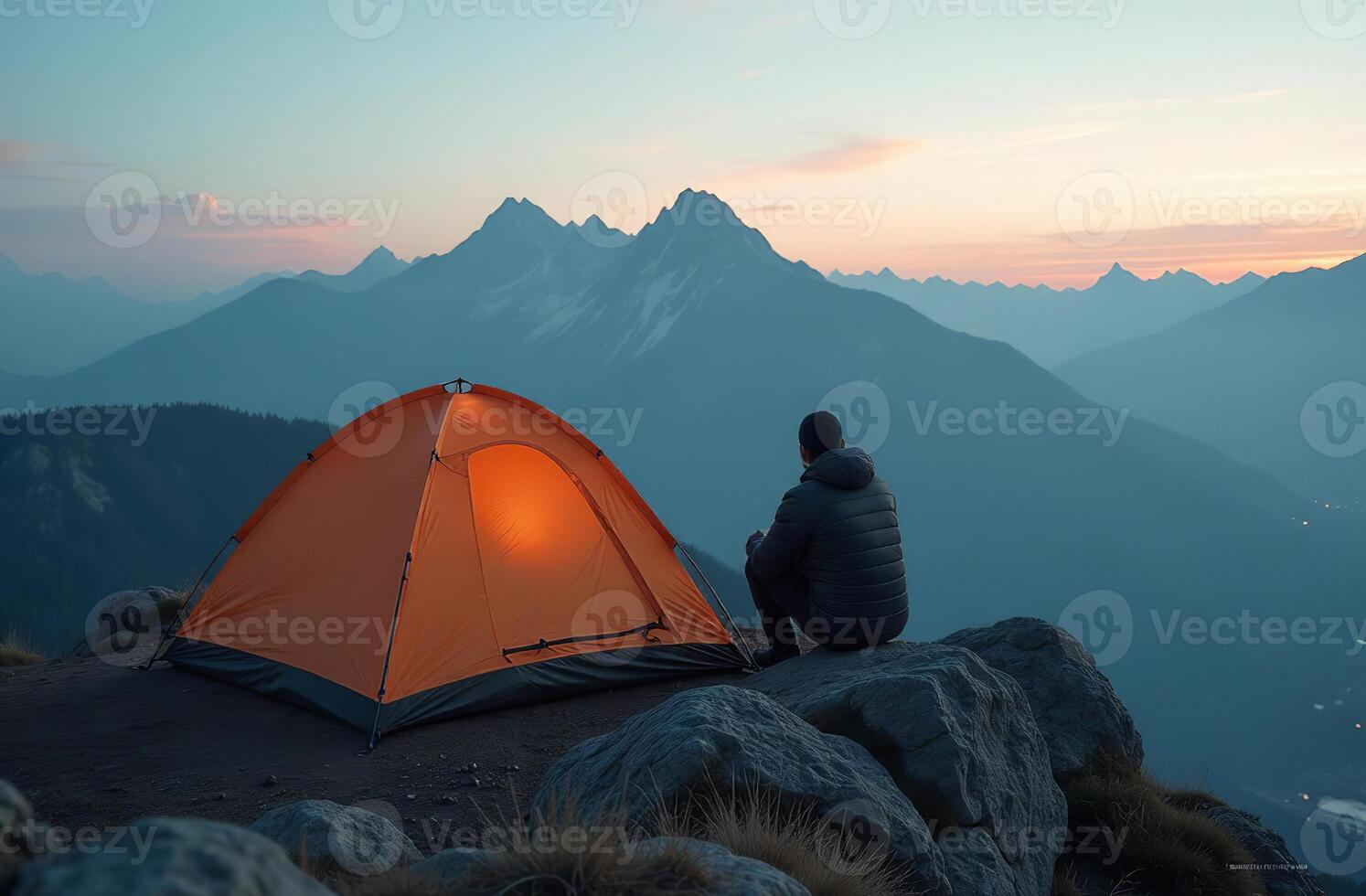 Man handsomehiking tourist in mountains. Active vacation in nature photo