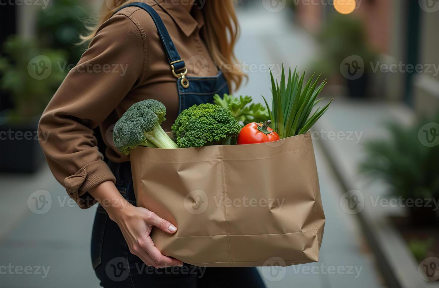 Girl carry purchase paper bag, vegetable and fruit from market photo