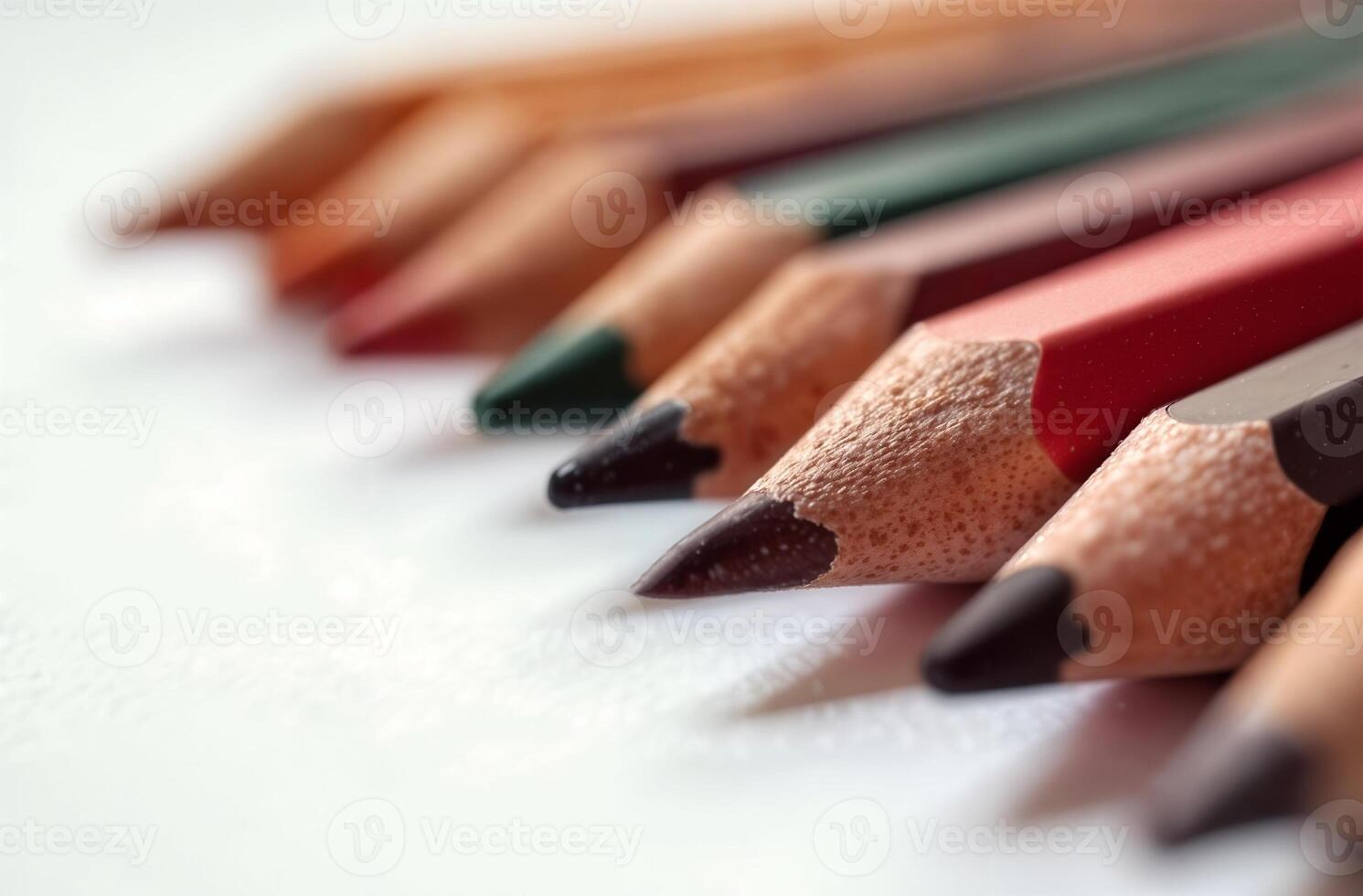 Pencils lie on white paper art tool for hobby of drawing photo