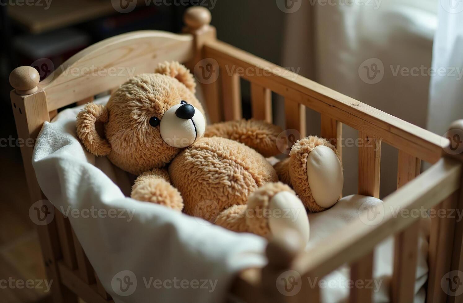 Teddy bear lying in crib, stuffed toy in interesting children bedroom photo