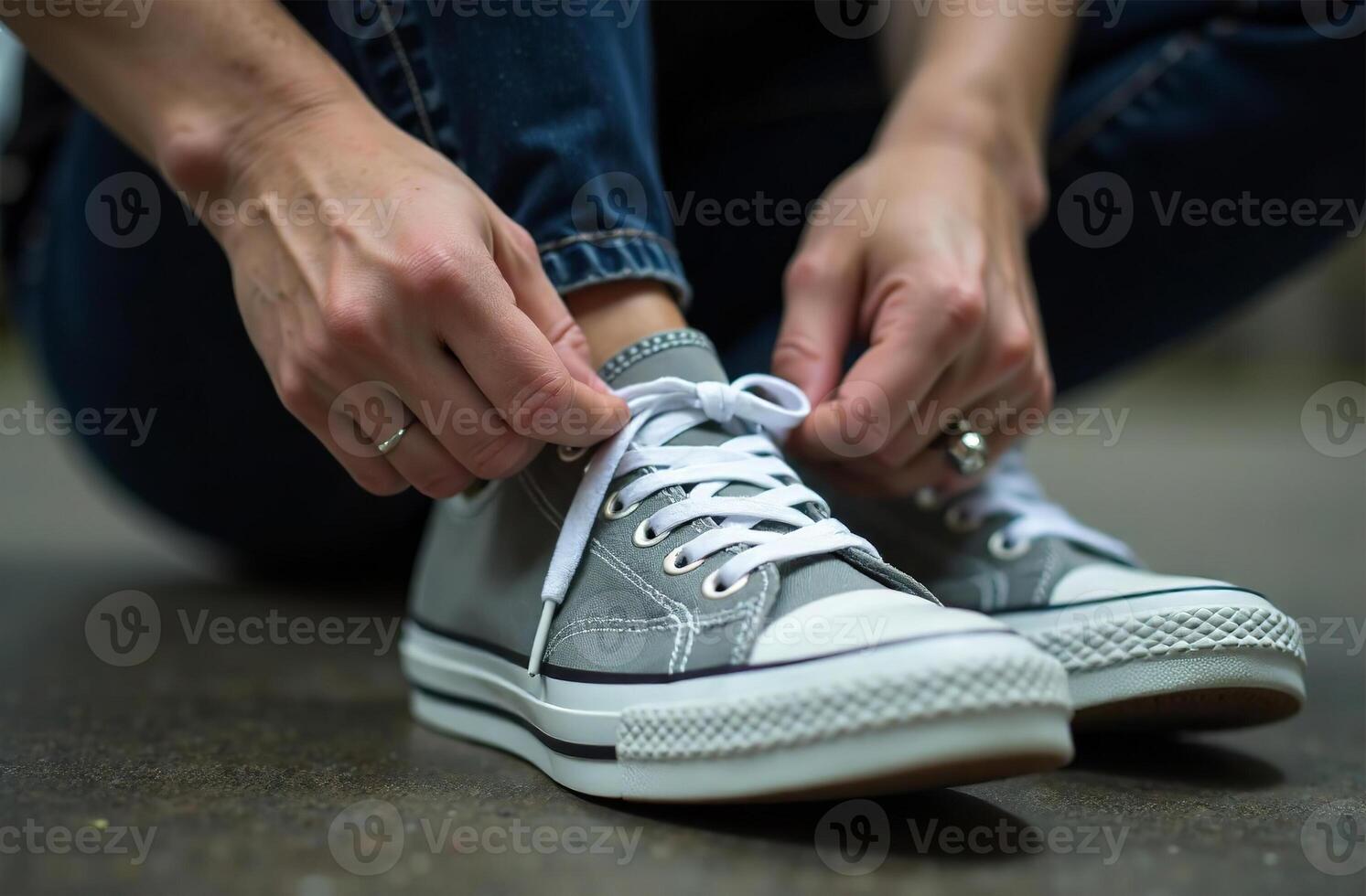 Runner tying shoelaces of sport sneakers cardio workout outside photo