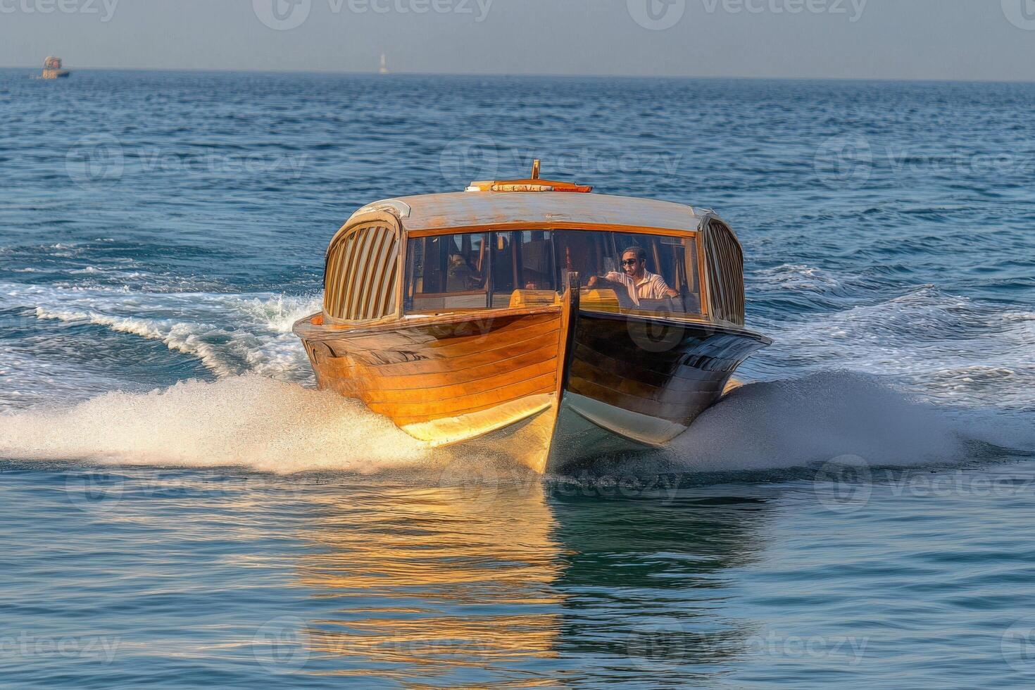 A boat with a wooden hull photo