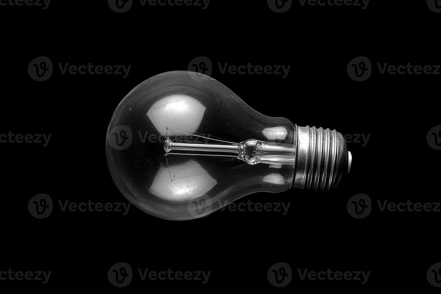 A Close-Up View of an Unlit Incandescent Light Bulb photo