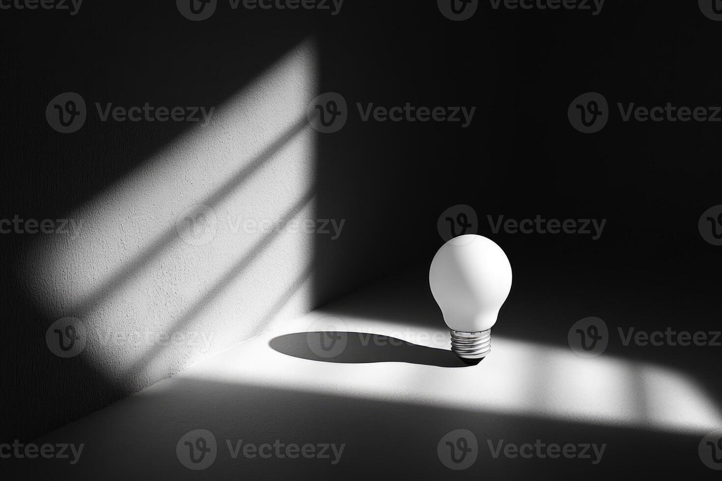 A Single Light Bulb in a Dark Room with Sun Rays Streaming Through a Window photo
