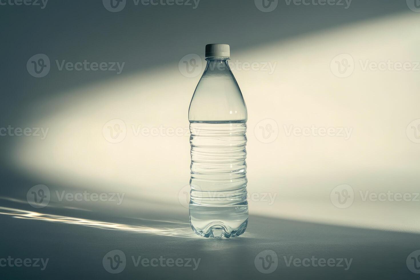 A Single Water Bottle on a Light and Shadowed Surface photo