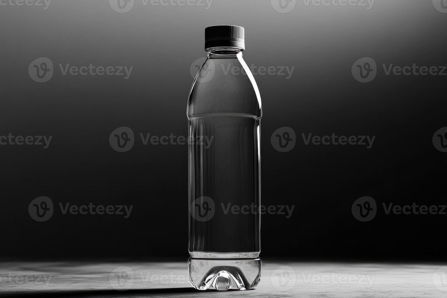 A Clear Plastic Water Bottle on a Gray Surface photo