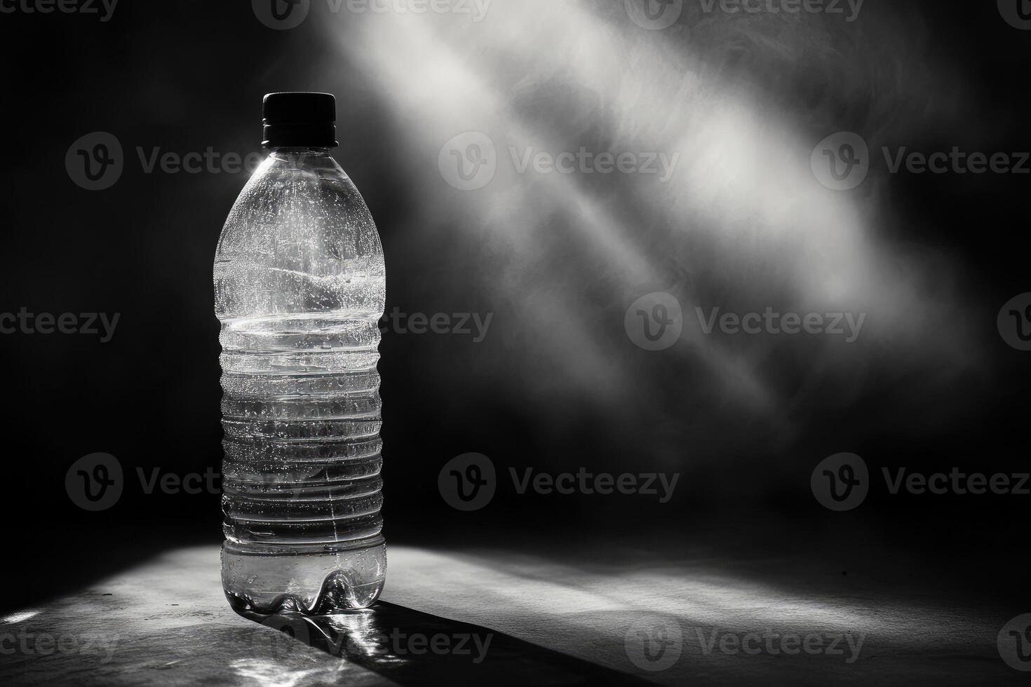 Single Water Bottle with Dramatic Lighting and Smoke Effect photo