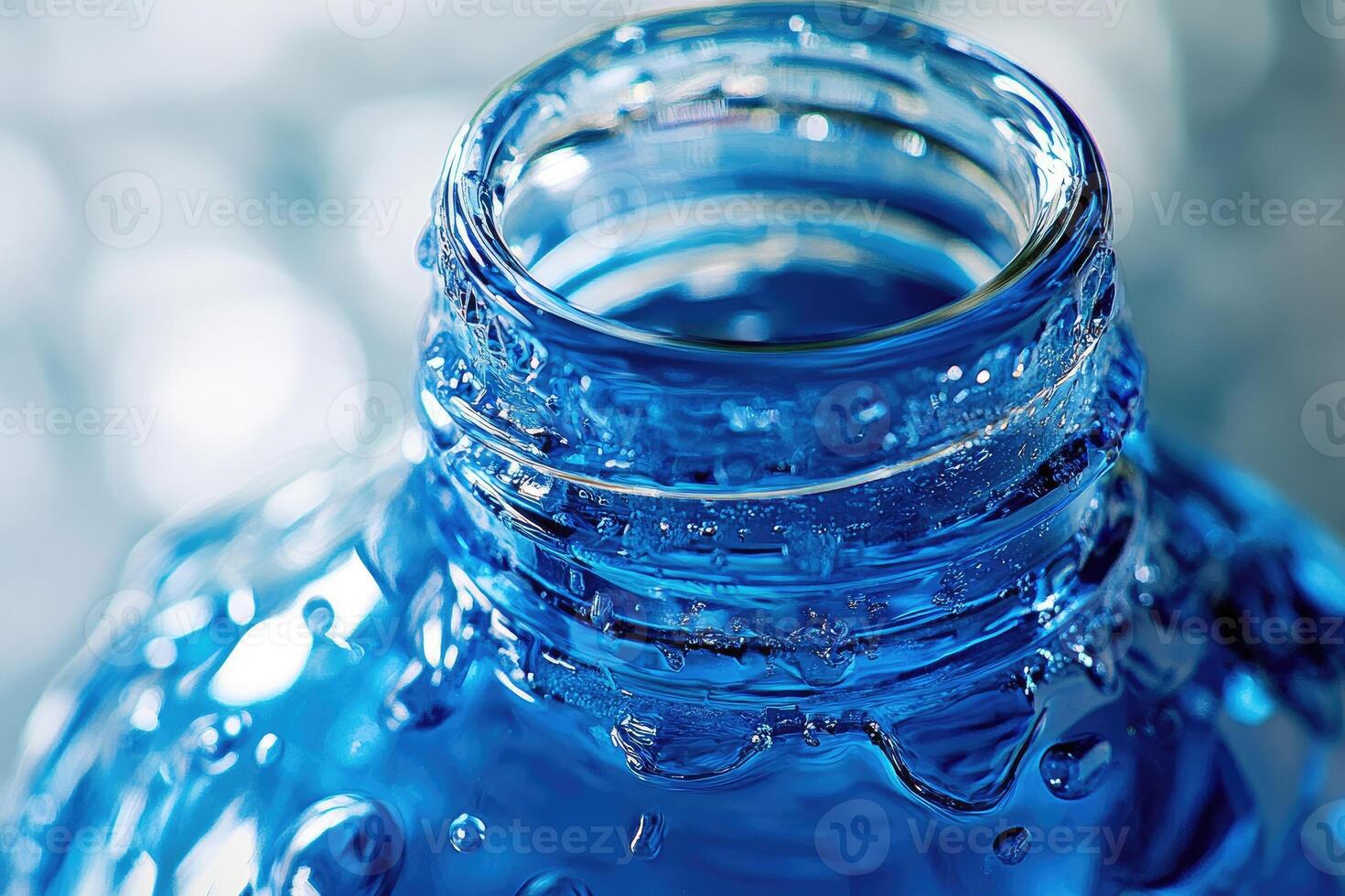 Close-up of a Blue Plastic Water Bottle with Condensation photo