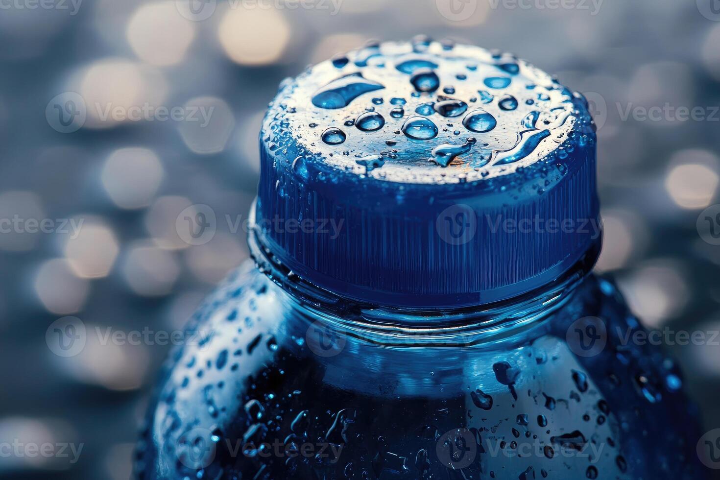 Close-up of a Blue Water Bottle Lid Covered in Water Droplets photo