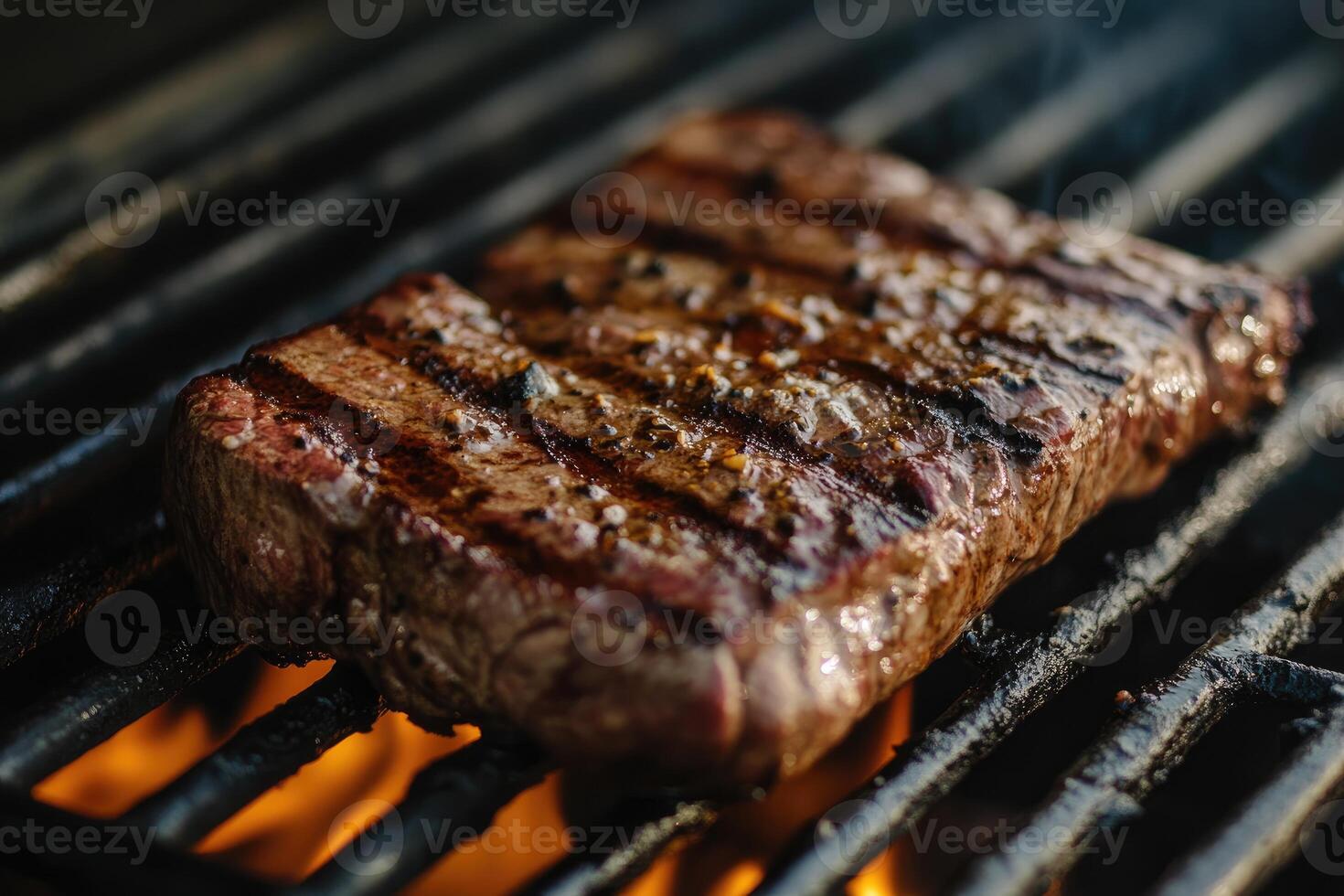 Grilled Steak Cooking Over Open Flames photo