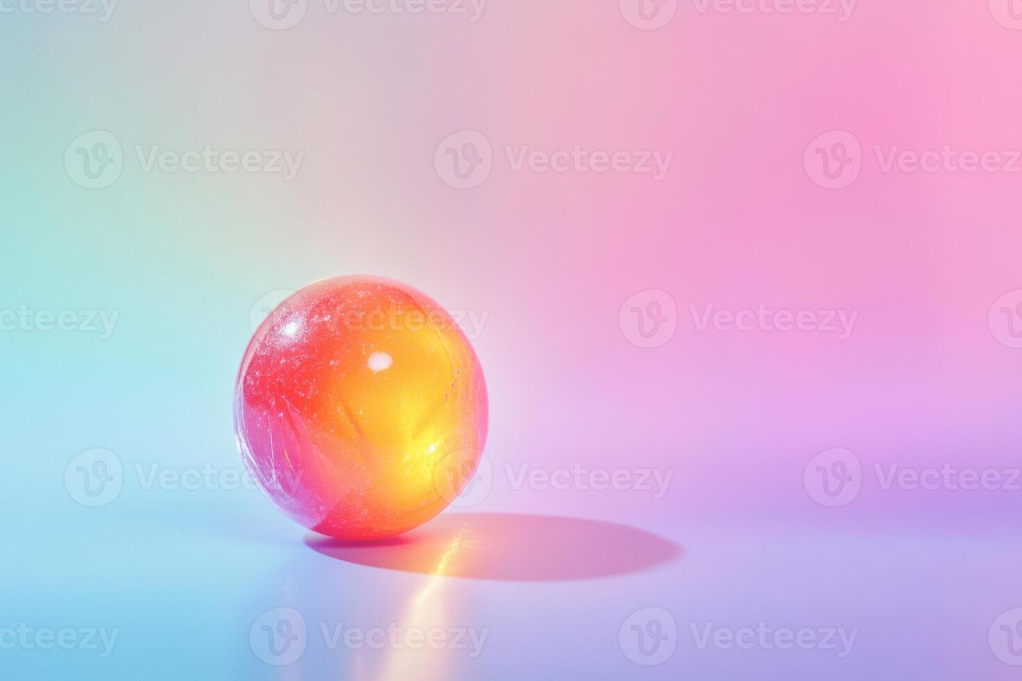 Translucent Sphere on Pastel Background Showing Light Refraction photo