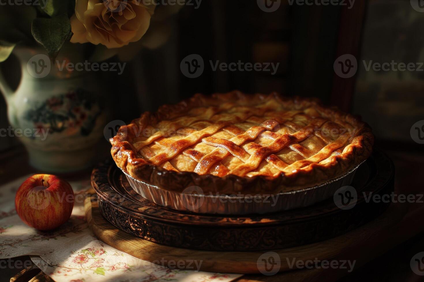 Golden Crust Apple Pie On Wooden Stand photo